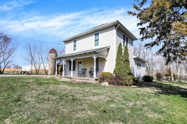 view of front of property with a front lawn