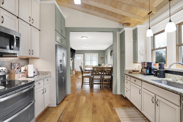 kitchen with wooden ceiling, appliances with stainless steel finishes, light stone counters, light wood-type flooring, and sink