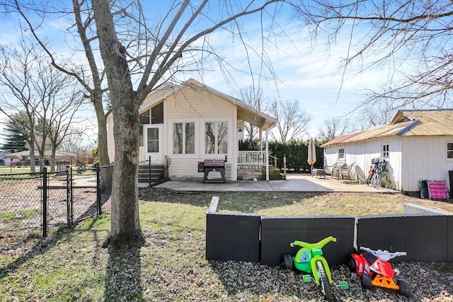 back of property with a patio area