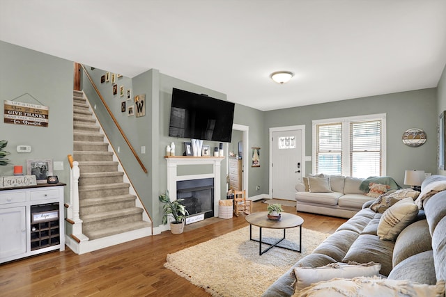 living room with light hardwood / wood-style flooring