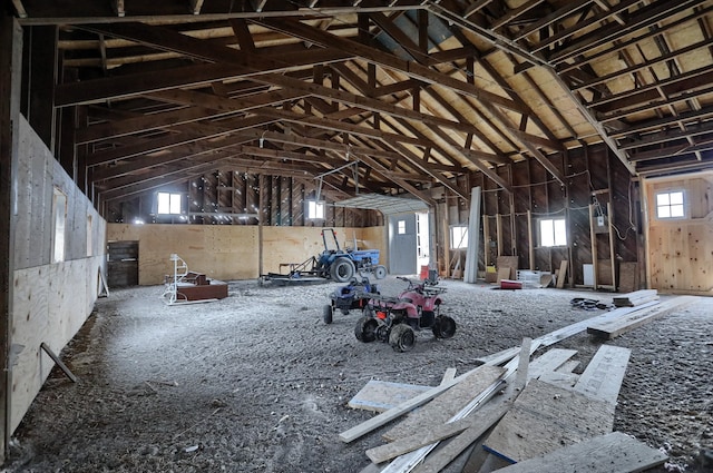 miscellaneous room with a towering ceiling