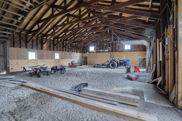 interior space featuring high vaulted ceiling and a wealth of natural light