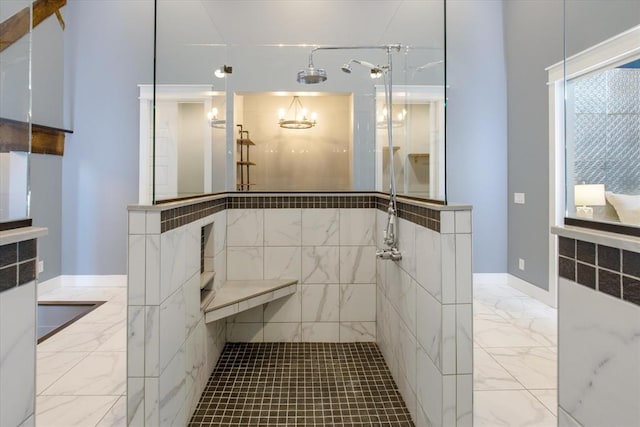 bathroom with tile floors, a shower, and tile walls