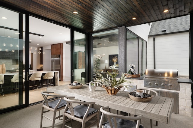 dining room featuring wooden ceiling