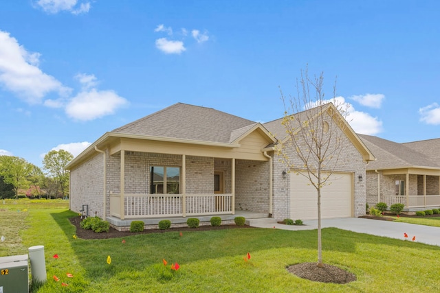 ranch-style home with a garage, a front lawn, and covered porch