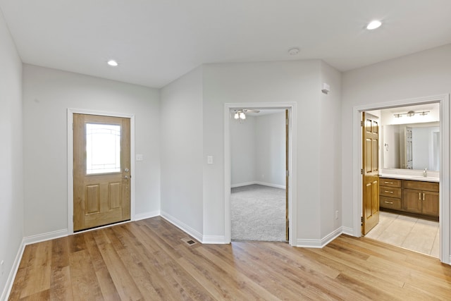 entrance foyer featuring light hardwood / wood-style flooring