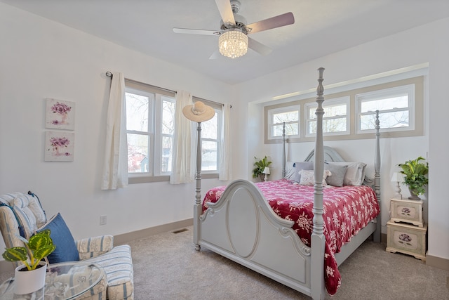 bedroom with light carpet and ceiling fan