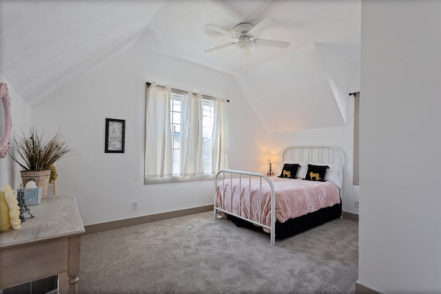 bedroom featuring vaulted ceiling, ceiling fan, and carpet floors