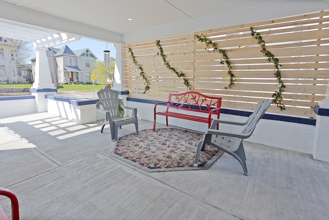 view of terrace featuring a pergola