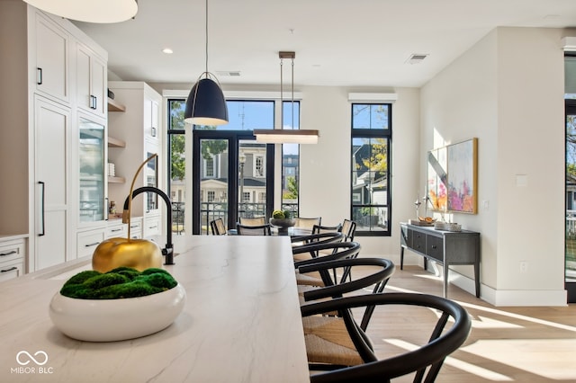 dining room featuring light hardwood / wood-style floors