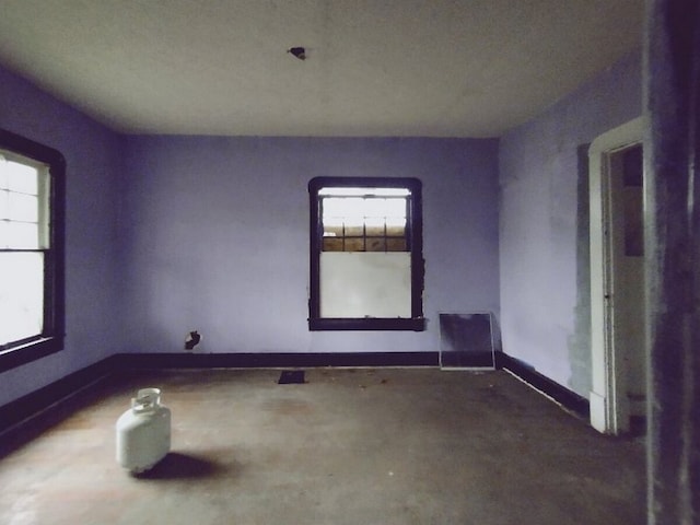 empty room featuring concrete flooring