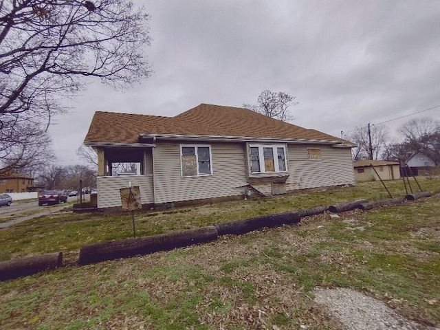 view of property exterior featuring a yard