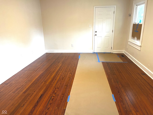 interior space with dark wood-type flooring