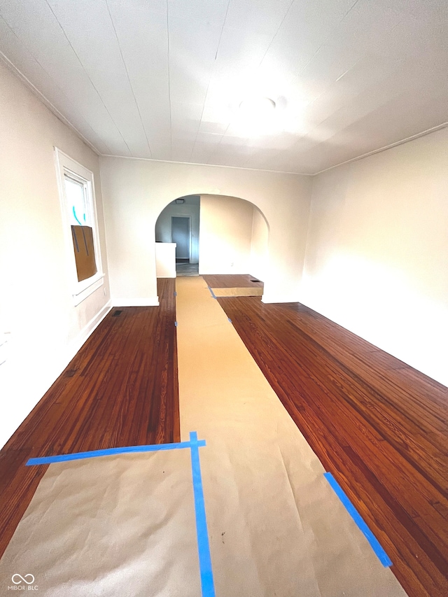 spare room featuring hardwood / wood-style floors