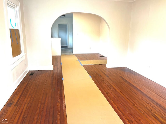 unfurnished room featuring wood-type flooring