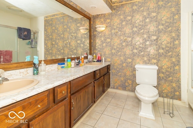 bathroom with walk in shower, tile patterned floors, vanity, and toilet