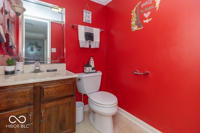 bathroom featuring tile patterned flooring, vanity, and toilet