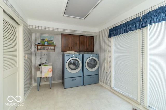 1205 Ivywood Ct, New Castle, IN 47362 - washroom with separate washer and dryer, cabinet space, and baseboards