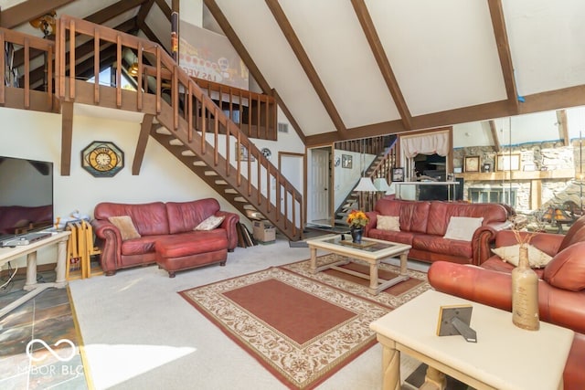 living room with carpet floors, high vaulted ceiling, and beamed ceiling