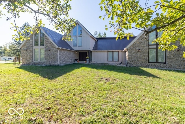 1205 Ivywood Ct, New Castle, IN 47362 - view of front of property featuring metal roof, stone siding, and a front lawn