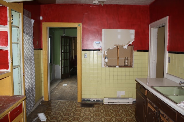 bathroom with vanity, tile walls, and tile patterned floors