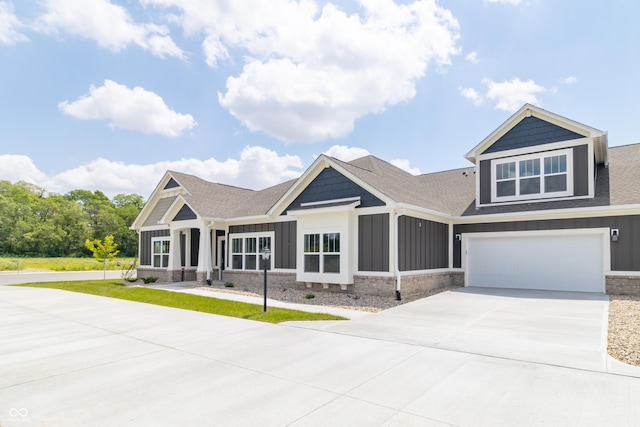 craftsman-style home with a garage