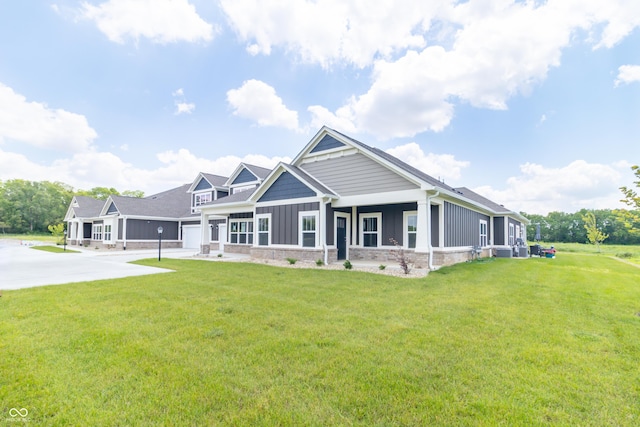 view of front facade with a garage and a front lawn