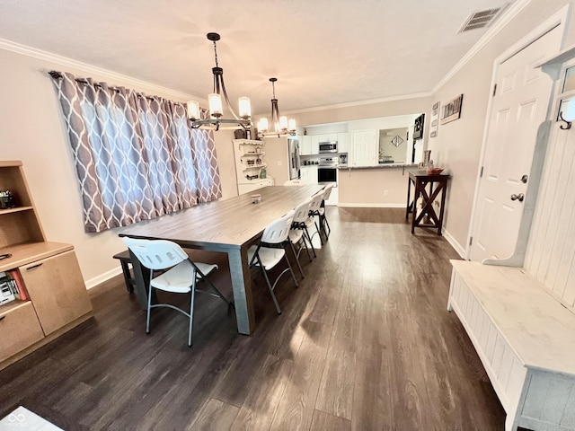 dining room featuring crown molding, an inviting chandelier, baseboards, visible vents, and dark wood-style floors