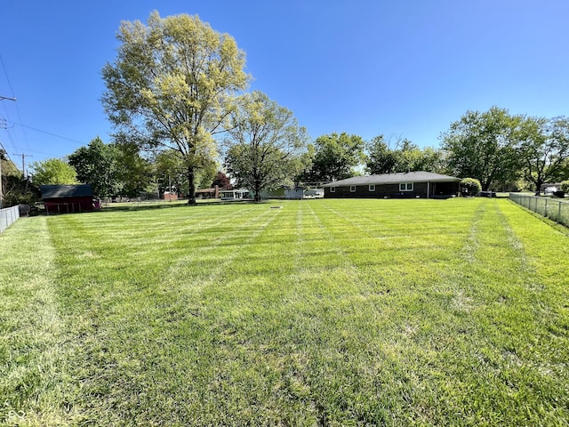 view of yard with fence