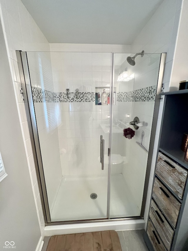 bathroom featuring a stall shower