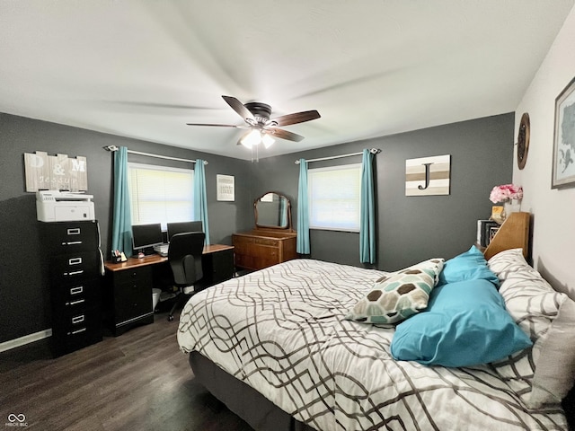 bedroom with ceiling fan and dark wood-style flooring