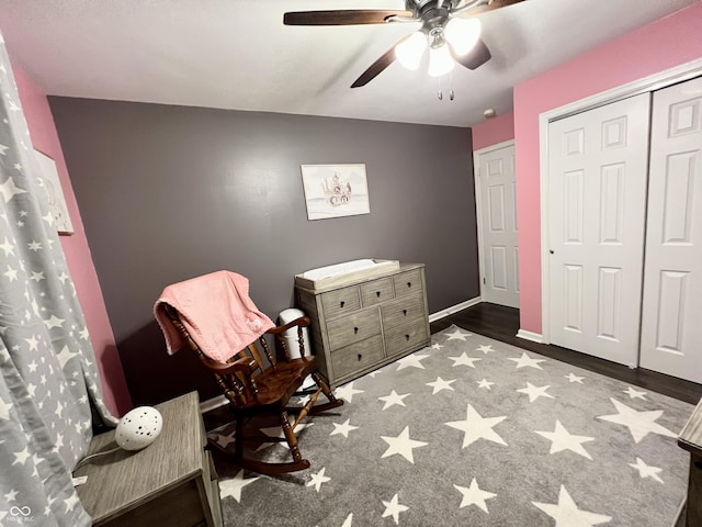 living area featuring a ceiling fan