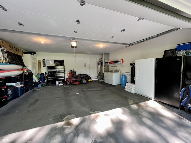garage featuring a garage door opener and washing machine and dryer