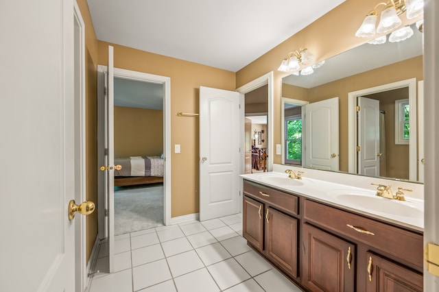 bathroom with tile flooring, double sink, and oversized vanity