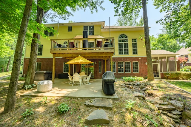 rear view of house featuring a patio