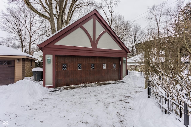 view of snow covered garage