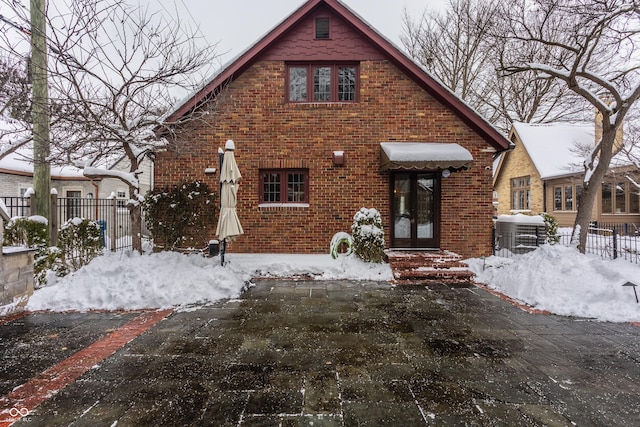 view of front of home with central air condition unit