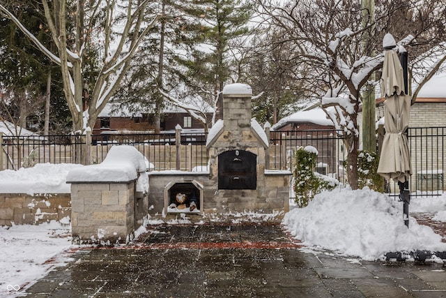 view of snow covered patio