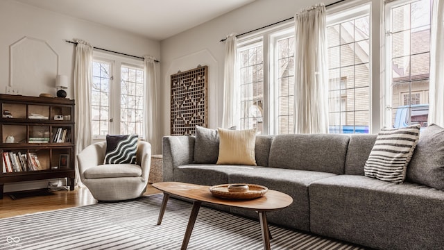 living area with hardwood / wood-style floors