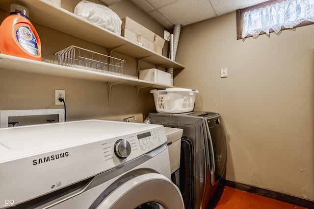 laundry room with washer and dryer