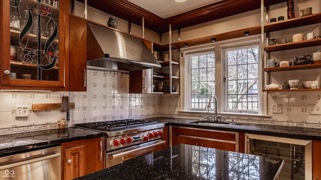 kitchen featuring sink, stainless steel appliances, beverage cooler, dark stone countertops, and extractor fan