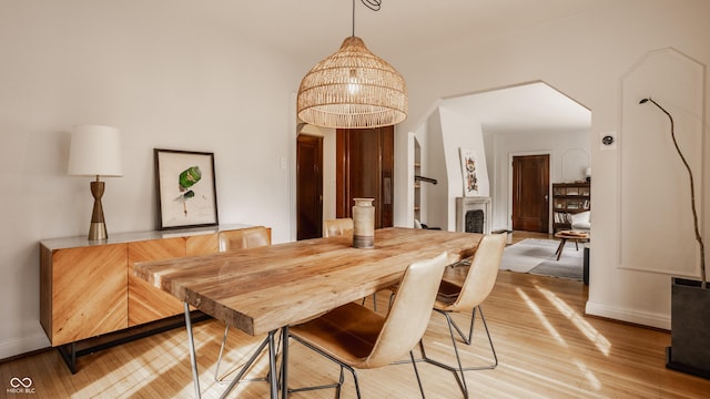 dining area with light wood-type flooring