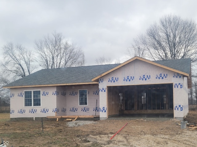 property under construction with a garage