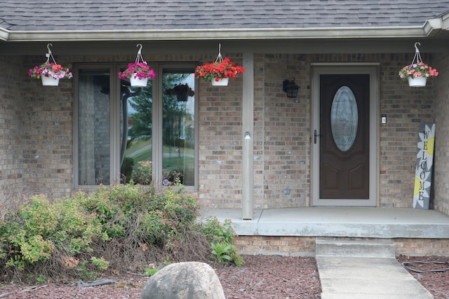 property entrance featuring covered porch