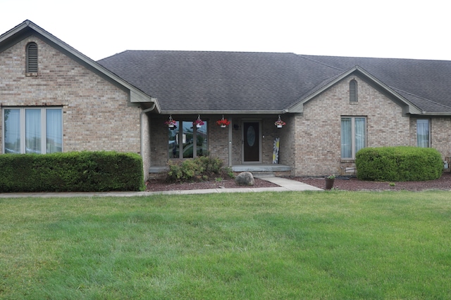 view of front facade with a front lawn