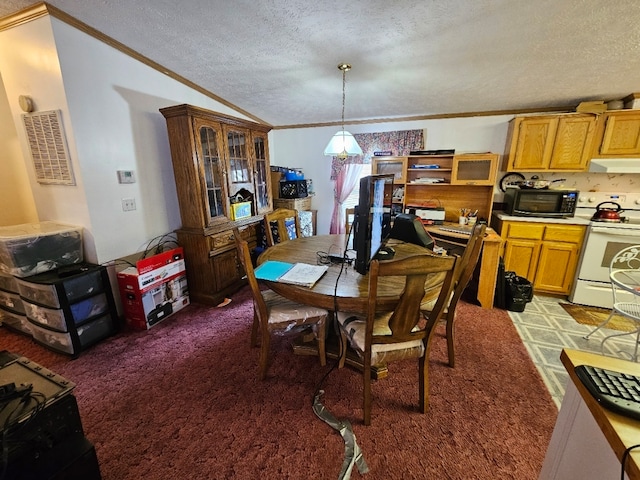 carpeted dining space featuring a textured ceiling, crown molding, and vaulted ceiling