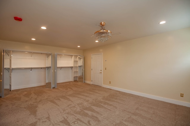 basement featuring light colored carpet