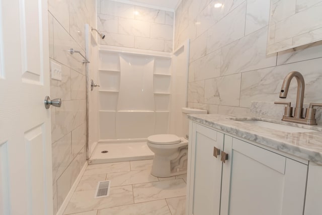 bathroom featuring toilet, tile flooring, walk in shower, and tile walls