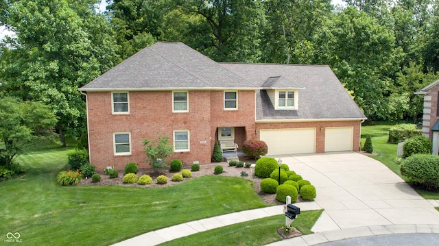 colonial house with a garage and a front yard