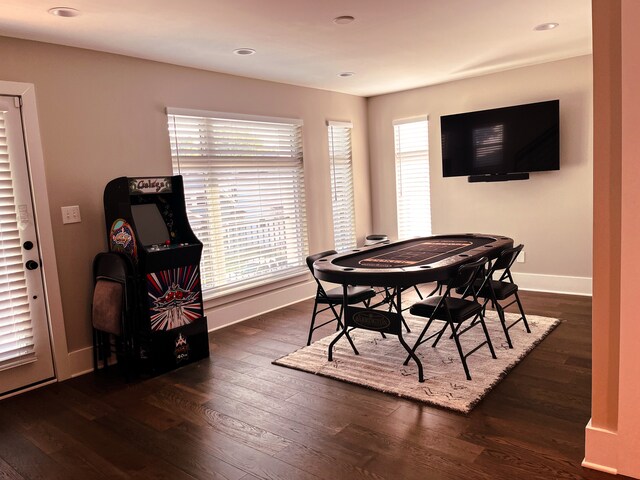 dining room with dark hardwood / wood-style flooring